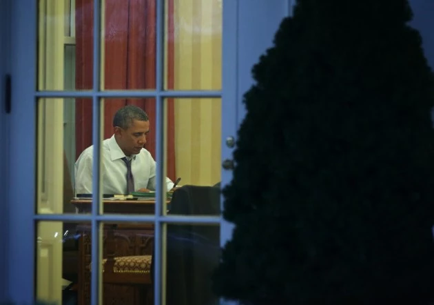 President Obama Works In The Oval Office At The White House President Obama Works In The Oval Office At The White House