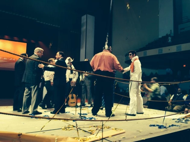 MUNI-ELVIS photo with Mayor Glover, "Elvis," and others in the ring after the ribbon-cutting